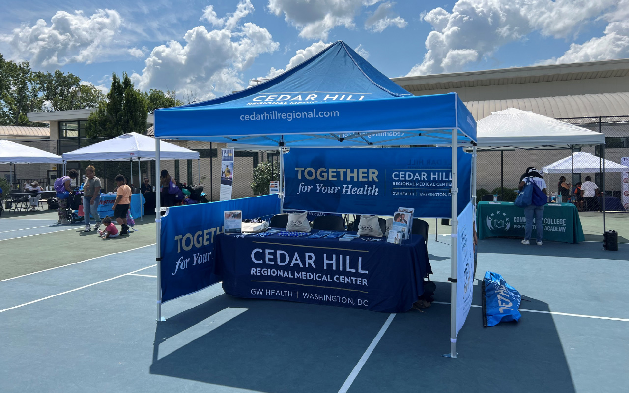Outdoor festival banner and wayfinding signs