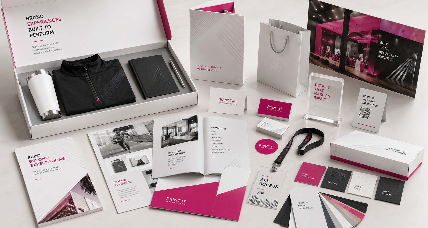 A custom branded welcome kit from Print It of South Florida with apparel, brochures, foil and spot UV finish samples, and premium paper selections