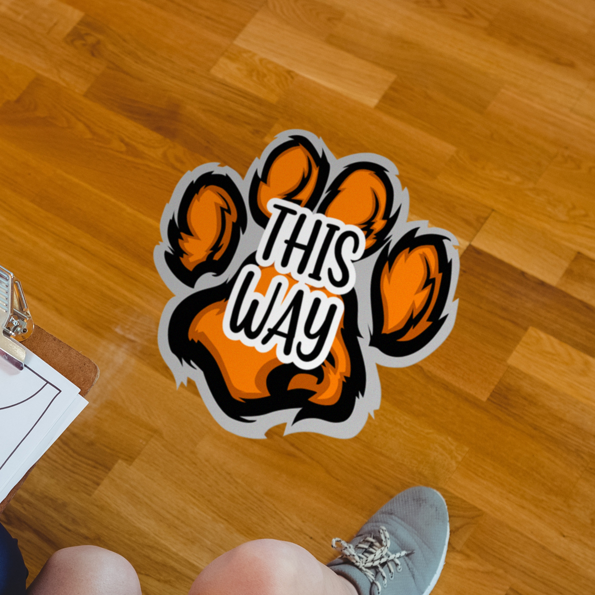 Team logo floor decal applied to carpet